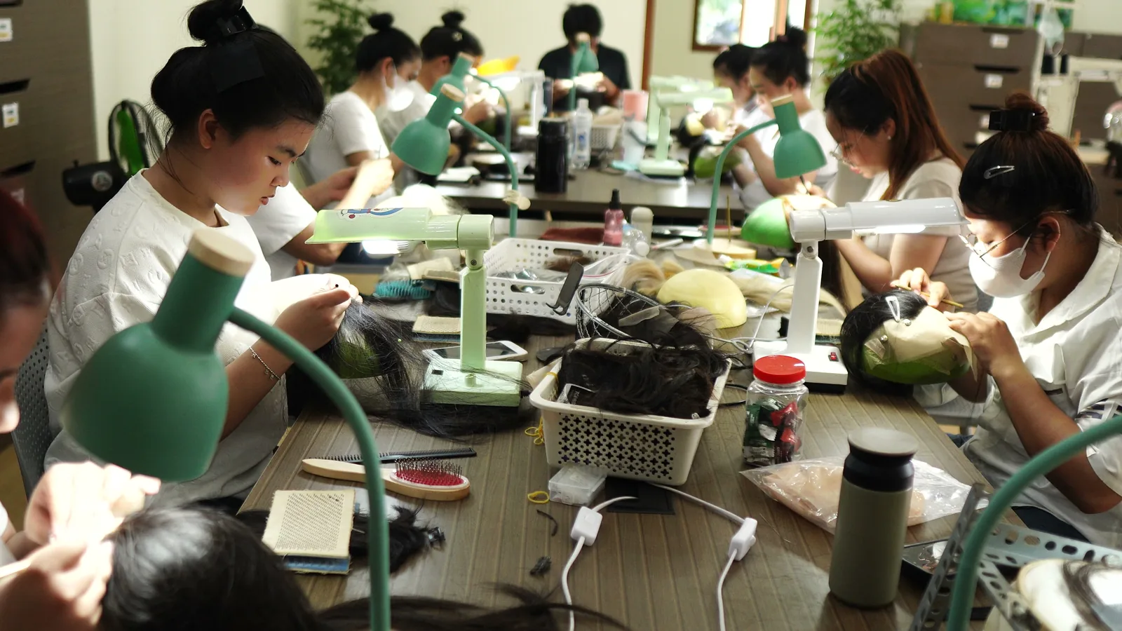 Artisans at work in the Wigs Vietnam atelier